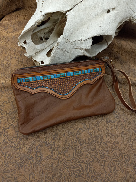 The Floating Feather Wristlet